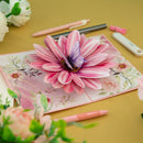 Biglietto pop-up fiore con farfalla