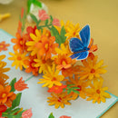 Biglietto Biglietto pop-up con margherite colorate e farfalle