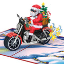 Biglietto pop-up con Babbo Natale su una motocicletta